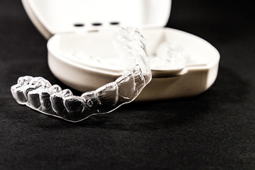 Aligners sitting on a hard case