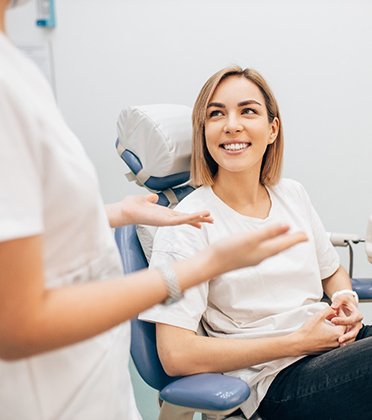 patient asking dentist about cosmetic dentistry in Aurora