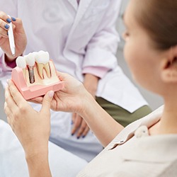 An implant dentist in Norwalk explaining implant candidacy