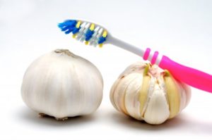 toothbrush and garlic