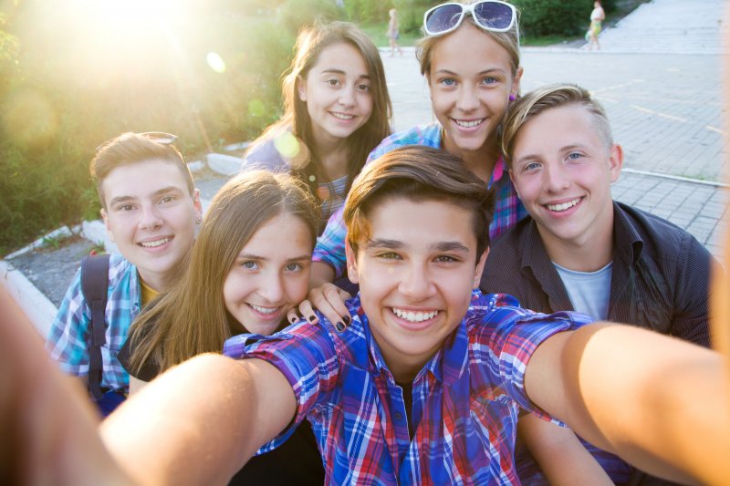 portrait of some smiling teenagers